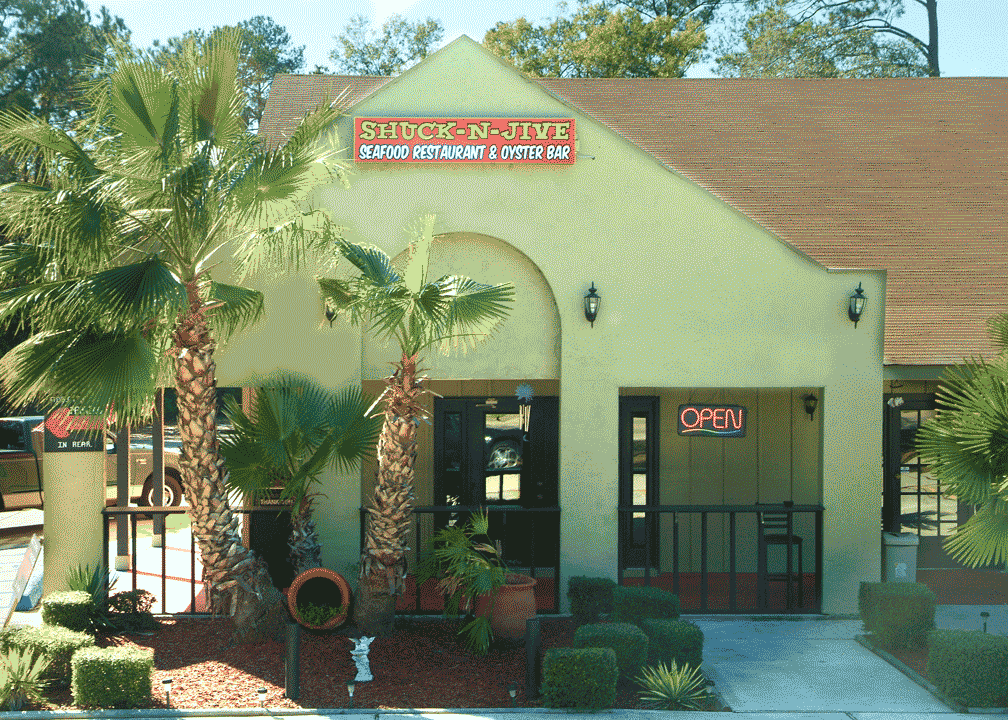 Front Of Building With sign saying Shuck N Jive